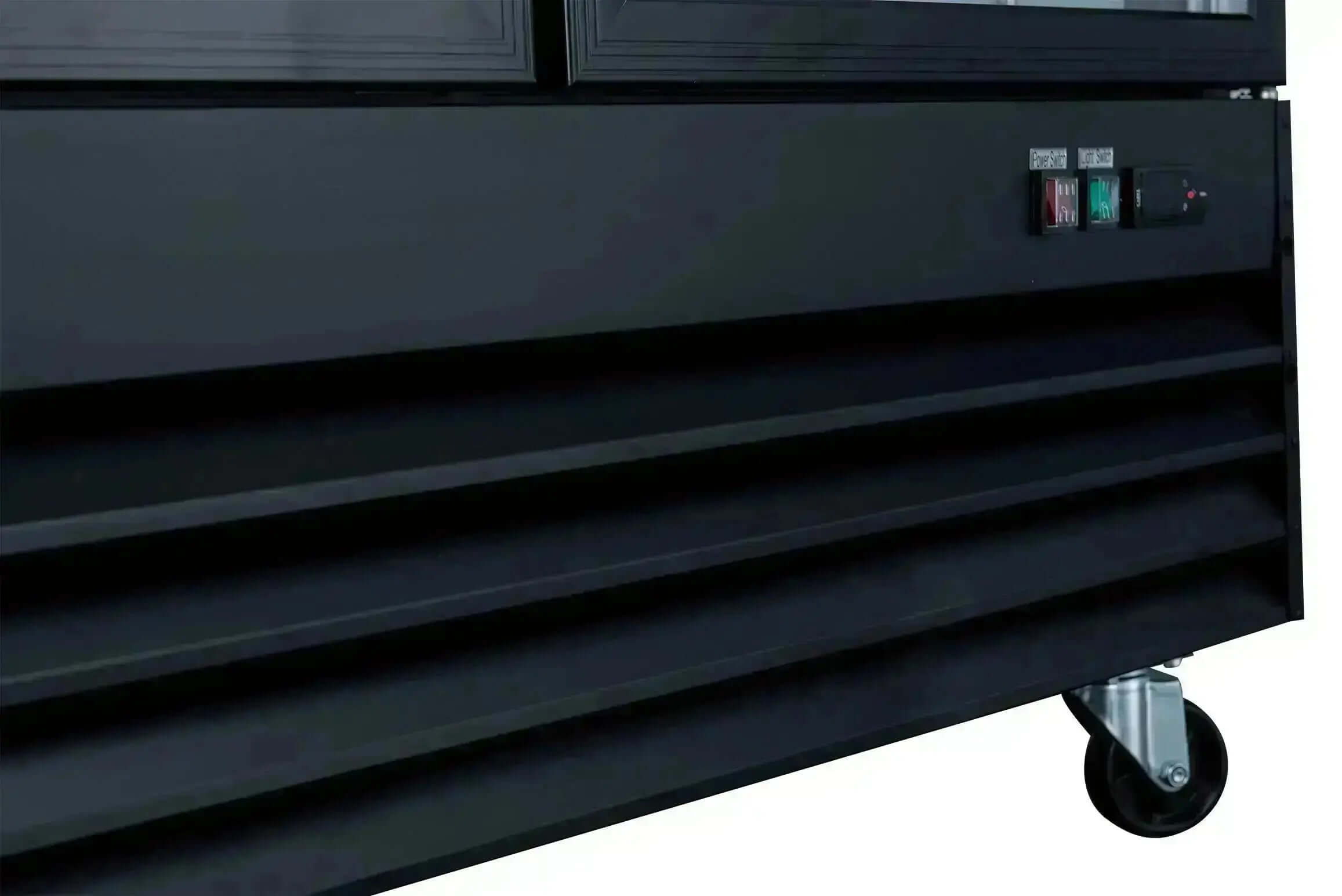 Close-up view of the control panel and base of the D648BMF-HC glass door freezer, highlighting functionality and design.
